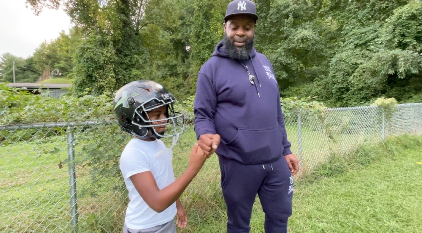 Joe Greene with his son at football practice